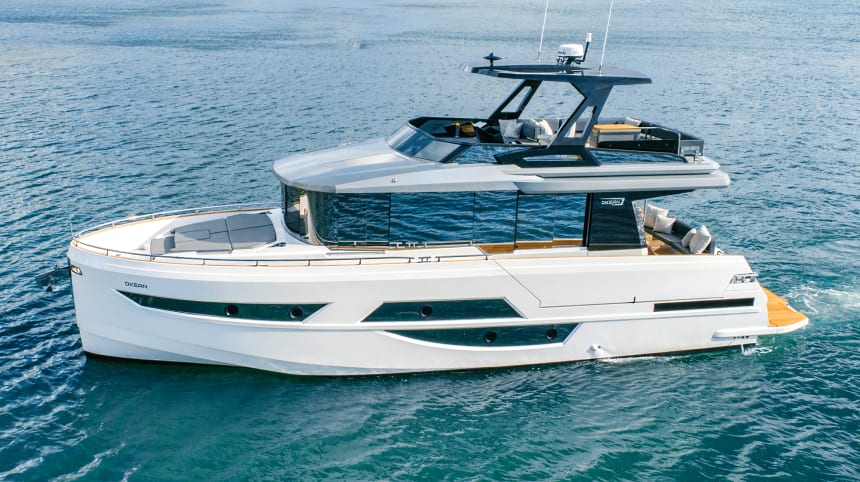 You can tell by the size of the windows that the interior of this three-stateroom boat is bright; at the stern is a mini version of a yacht’s beach club.