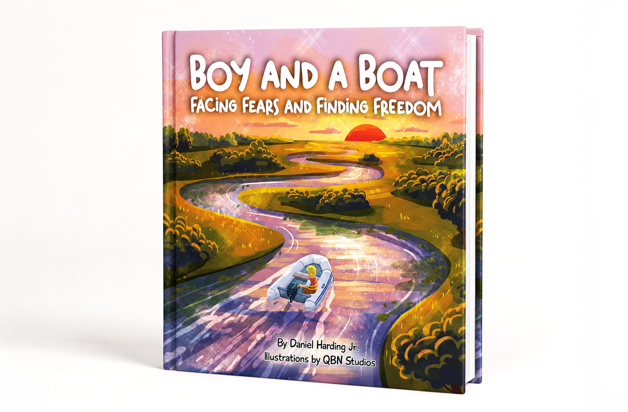 The front cover of the children's book titled "Boy and a Boat: Facing Fears and Finding Freedom", written by Daniel Harding Jr. and illustrated by QBN Studios. The cover art features an illustrated scene of a young boy in a life jacket driving a small white dinghy down a winding river toward a bright red setting sun, surrounded by lush green shoreline trees.