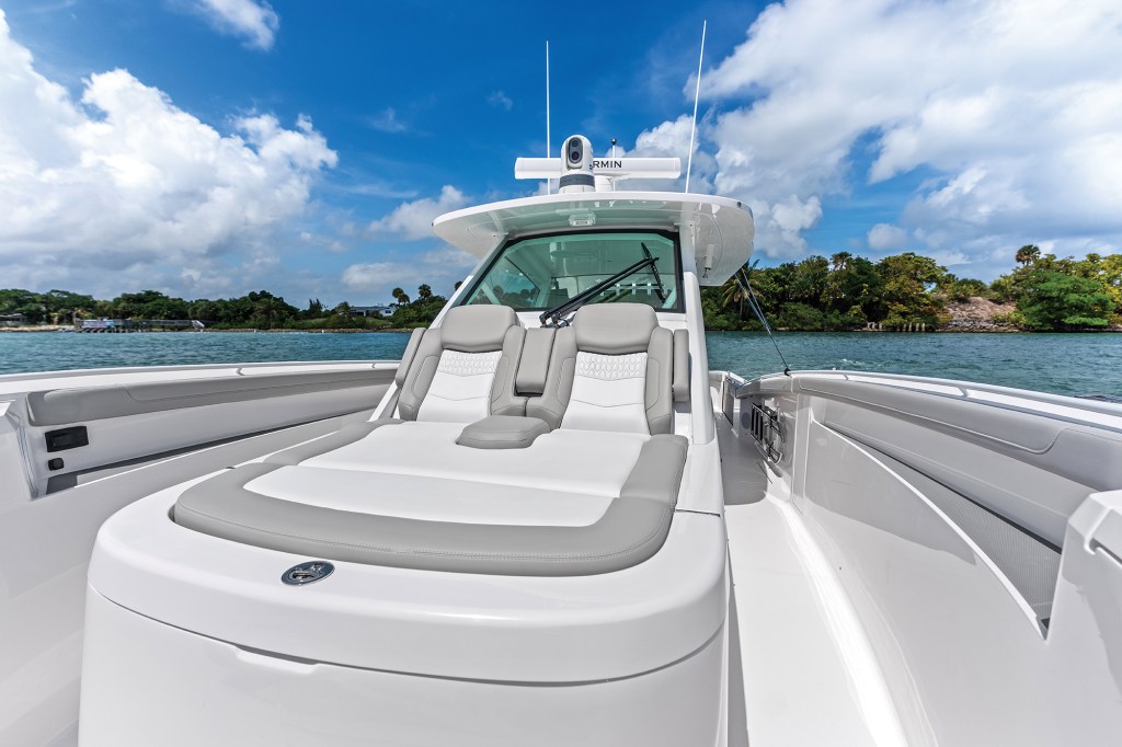 Forward bow lounge seating and hardtop radar station on the Scout 435 LXF luxury center console boat.